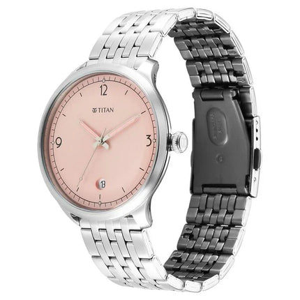 a watch with a pink dial on a bracelet