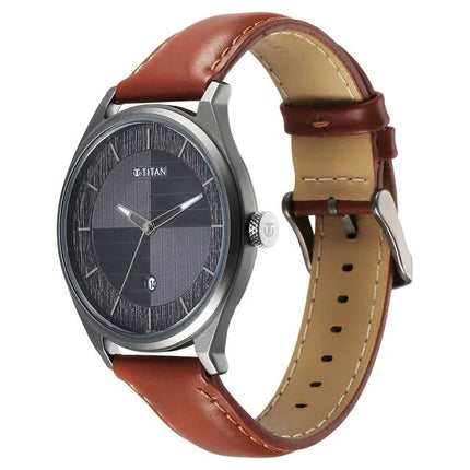 a watch with a brown leather strap