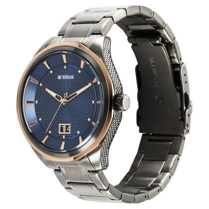 a watch with a blue dial and two tone steel bracelet