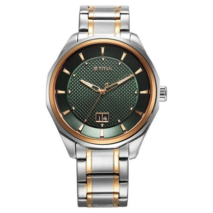 a silver and gold watch with a green dial