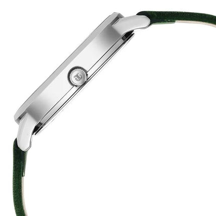 a close up of a watch on a green strap