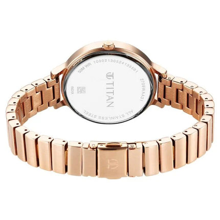 a women's watch with a rose gold bracelet