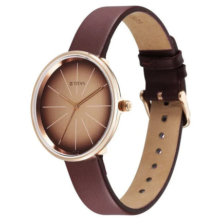 a brown watch with a brown strap