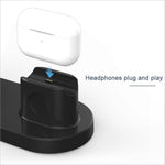 White apple airpods case resting on black 3-in-1 15w wireless charging pad stand for airpods phone watch