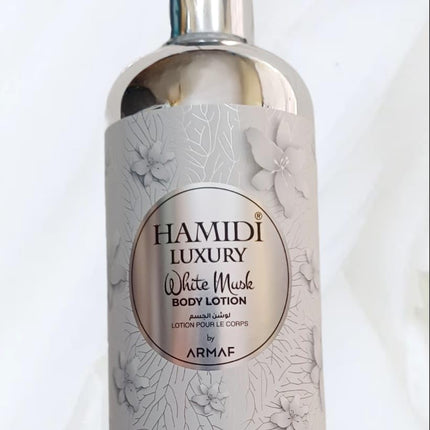 Hamidi Luxury White Musk Body Lotion 500 Ml with elegant floral design, offering a premium white musk lotion fragrance for a sophisticated scent and hydration.