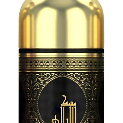 a black and gold canister with arabic writing