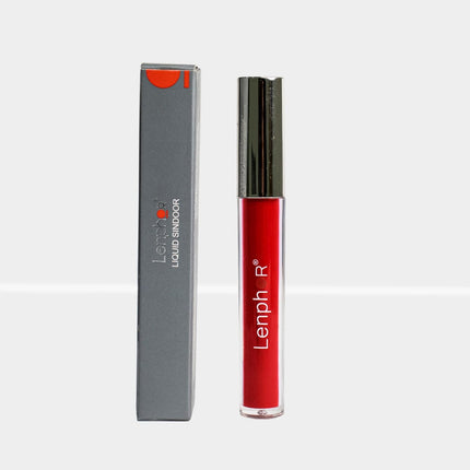 Flat lay of Lenphor Liquid Sindoor with packaging, illustrating its vegan and cruelty-free attributes.