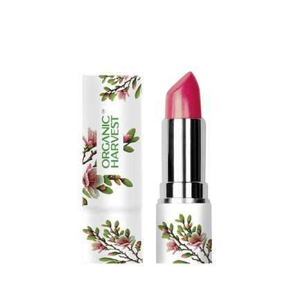 Organic Harvest Moisture Matte Lipstick in Beetroot Red being held in hand, exemplifying the chic design of this organic matte lipstick tube.
