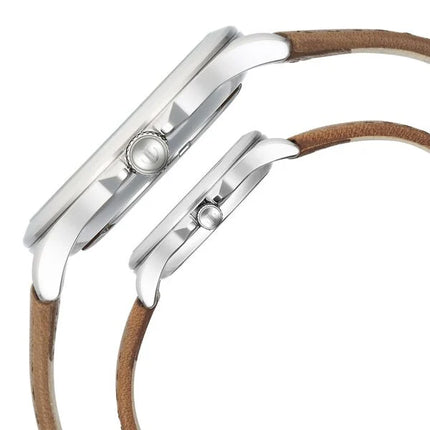 a couple of watches sitting next to each other