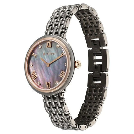 a women's watch with a mother of pearl dial