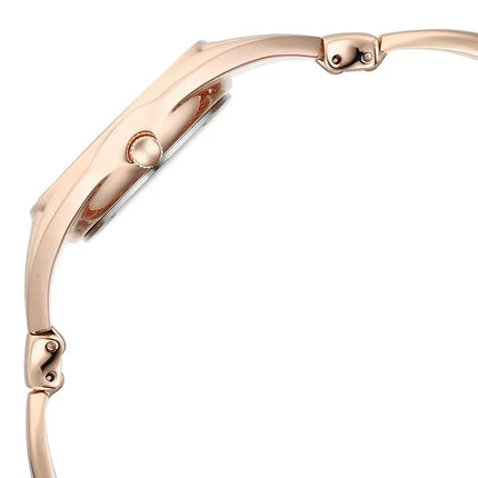 Detailed view of the Titan Raga Memoirs women's watch showing the crown and case design, emphasizing the craftsmanship in rose gold.