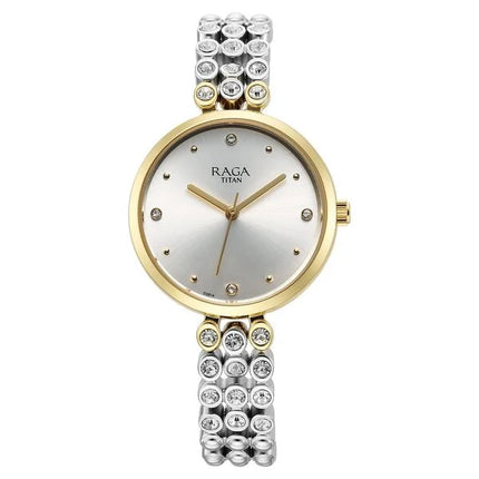 Titan Raga Showstopper Quartz Analog watch featuring a silver dial and two-toned metal strap adorned with crystals.