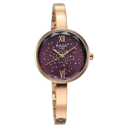 Titan Raga Showstopper women's quartz analog watch featuring a purple dial with sparkling accents, rose gold metal strap, and a round case.