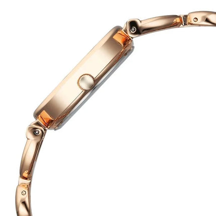 Detailed view of the side profile of Titan Raga Watch, showcasing the metal strap design and push-button crown for easy time adjustment.