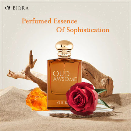 Oud Awsome perfume accompanied by natural elements like wood and roses, with the text 'Perfumed Essence Of Sophistication' highlighting its richness.