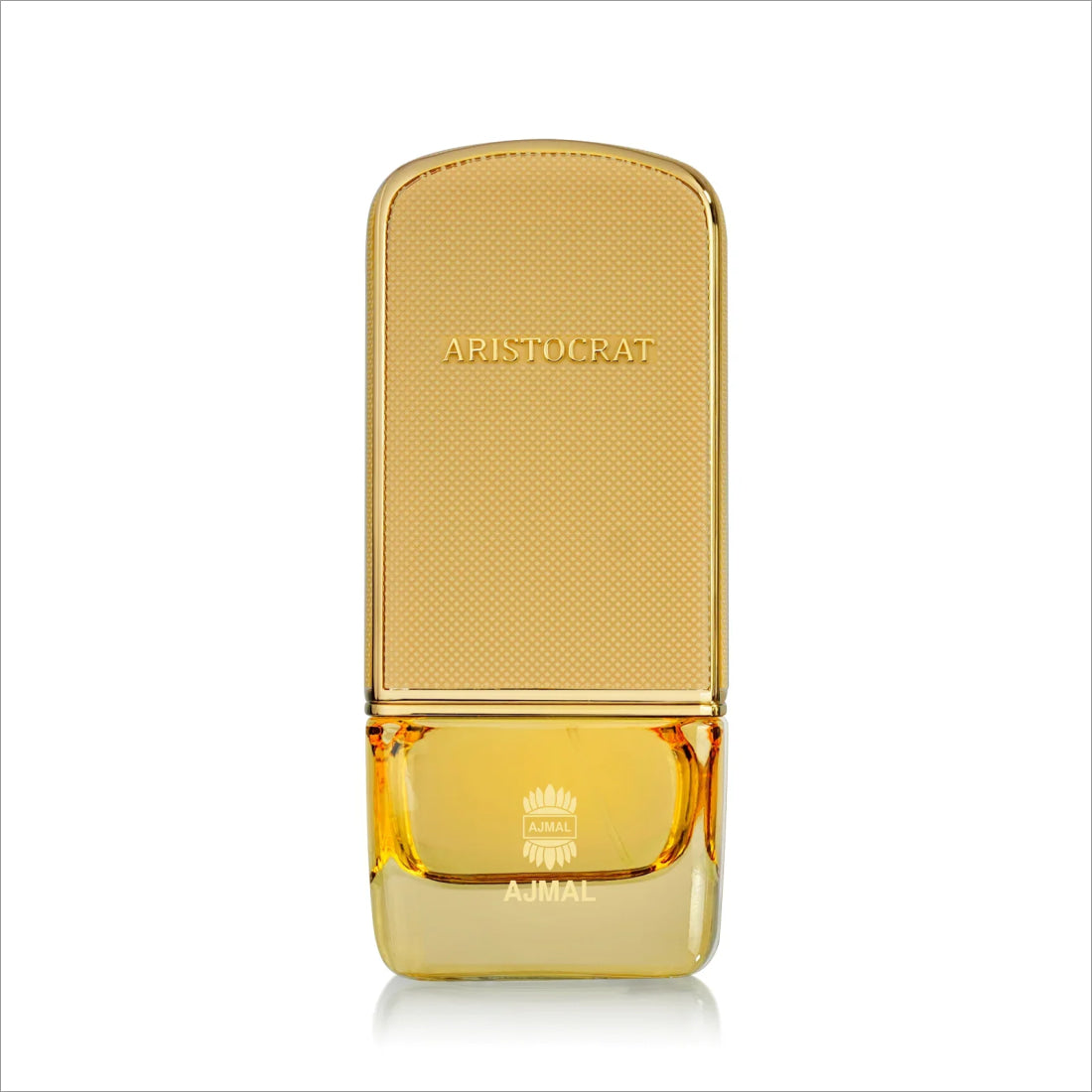a bottle of perfume sitting on top of a white surface