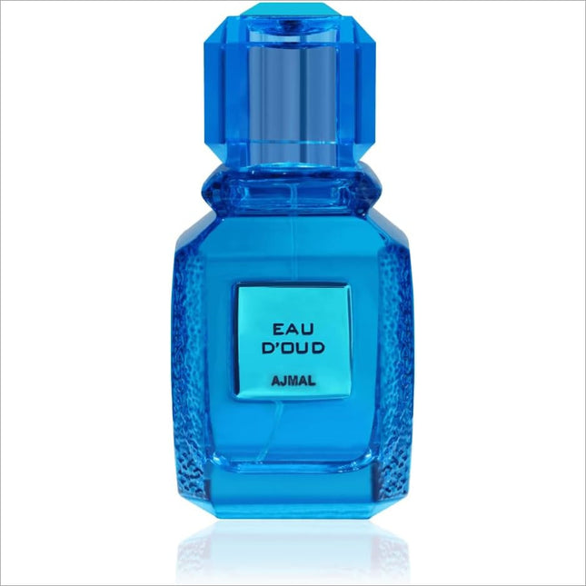 Ajmal Eau d’Oud Eau de Parfum 100ml bottle featuring a stunning blue design, ideal for both men and women. This luxurious fragrance invites sophistication, making it a perfect choice for MEN'S PERFUME and WOMEN PERFUME enthusiasts.