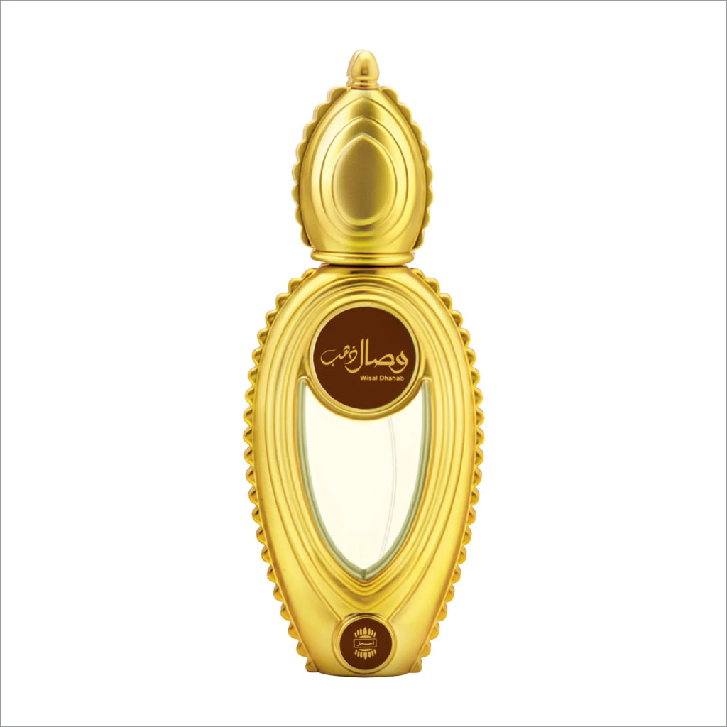 Golden ornate ajmal wisal dhahab 50ml perfume bottle with clear center showing light-colored oriental woody fragrance