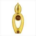 Golden ornate ajmal wisal dhahab 50ml perfume bottle with clear center showing light-colored oriental woody fragrance