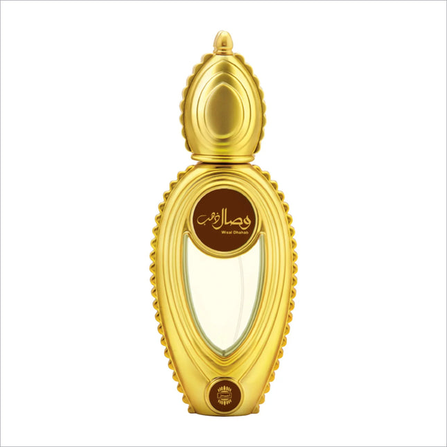 Golden ornate ajmal wisal dhahab 50ml perfume bottle with clear center showing light-colored oriental woody fragrance