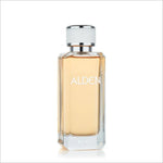Close-up view of the Alden EDP 100ml perfume bottle. The bottle's clear glass showcases the light amber fragrance, complemented by a silver cap and the engraved name 'ALDEN' for a refined look.