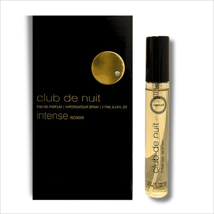 Armaf Club De Nuit Intense Women Eau De Parfum 7ML displayed alongside floral accents, embodying a sophisticated modern women's scent.