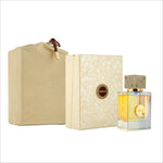 a bottle of perfume sitting next to a box