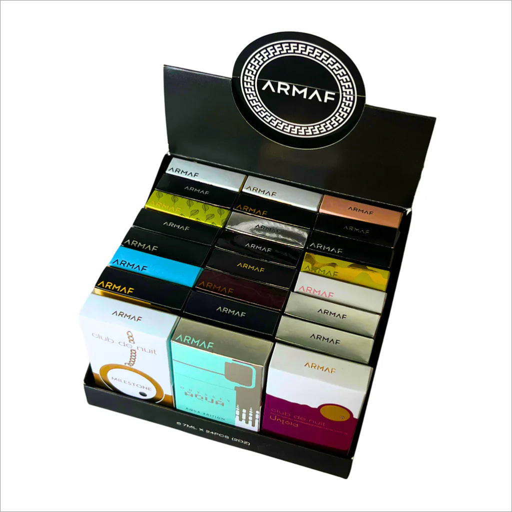 The Armaf Discovery Set - Premium Luxury Fragrance (7ML x 24 PCS) Long-Lasting Fragrance for Men & Women - Perfect for Gifting & Travel showcases an organized display of 24 miniature fragrances, ideal for a travel perfume set, showcasing the brand Armaf. This new collection provides a diverse selection for every occasion.