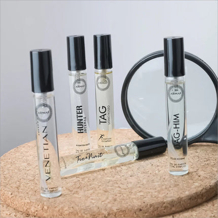 A dynamic display of the Armaf Discovery Set - Premium Luxury Fragrance (7ML x 24 PCS) Long-Lasting Fragrance for Men & Women emphasizes the brand's versatility. This captivating travel perfume set by Armaf, with its unique scents, creates a new standard for fragrance collections.