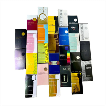 The Armaf Discovery Set - Premium Luxury Fragrance (7ML x 24 PCS) Long-Lasting Fragrance for Men & Women features various stylish miniature perfume containers, showcasing a range of options. Perfect for traveling, this new travel perfume set by Armaf adds an air of sophistication to any occasion.