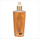 Close-up of Armaf Tag Her Mist 250ML showcasing its floral and gourmand elements, creating a warm inviting scent.