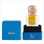 Perfume bottle with a gold-yellow scent, placed next to a blue box, featuring a stylish rose gold cap and 'Persona' branding, highlighting modern design.