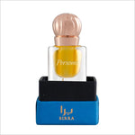 Clear glass perfume bottle featuring a golden-yellow fragrance, displayed in a black and blue box, with a rose gold cap and 'Persona' label.