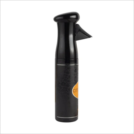 Lifestyle image of using Citrus Tinge 300ml room freshener spray to enhance a cozy living area.