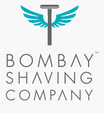 Bombay shaving company logo featuring a stylized gray razor with turquoise wings above the brand name in bold, sans-serif lettering.