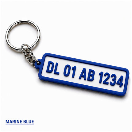 Marine blue custom number plate keychain with white center and raised lettering for car enthusiasts