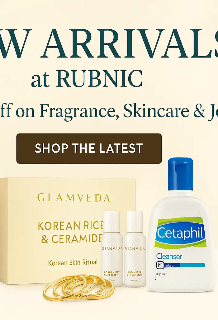 Dark green glass perfume bottle with black cap and white label reading ’wild stone edge’