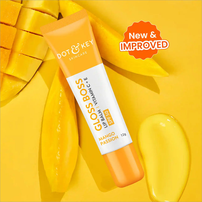 Dot & Key Gloss Boss Mango Passion Lip Balm with SPF 50 & Vitamin C+E, featuring a refreshing mango flavor lip balm for moisturized and cracked lips.