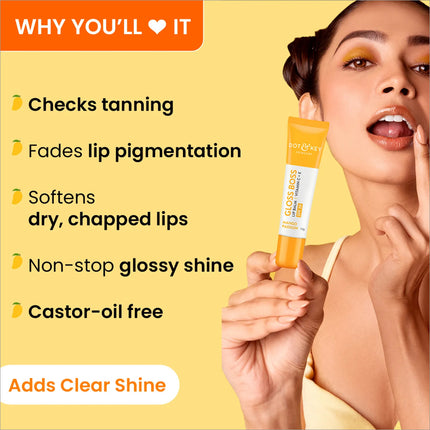 Dot & Key Gloss Boss Mango Passion Lip Balm, showcasing the vibrant tint and the nourishing mango flavor lip balm for all-day hydration.