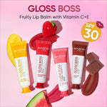 Flat lay of Dot and Key Gloss Boss Vitamin C + E Lip Balm with SPF 30 - Caramel Kiss, showcasing its benefits as a moisturizing lip balm with SPF.
