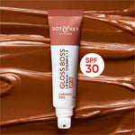 Swatch of Dot and Key Gloss Boss Vitamin C + E Lip Balm with SPF 30 on skin, emphasizing its moisturizing qualities as a lip balm with SPF.