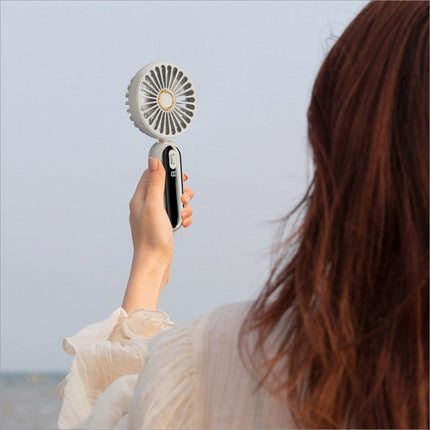F188 portable usb rechargeable handheld fan with white circular head black grip and two control buttons for wind speeds