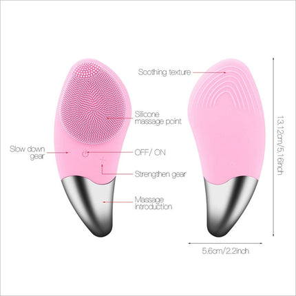 Pink silicone facial cleansing brush with metallic silver tip and textured bristles for deep skin cleansing and soothing