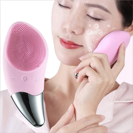 Pink silicone facial cleansing brush with metallic silver base and control buttons for deep cleansing with 5 speeds