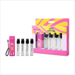 Pink rectangular travel-sized fastrack discovery perfume case with black carabiner clip and carry your vibe branding