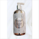 Hamidi Luxury White Musk Body Lotion 500 Ml with elegant floral design, offering a premium white musk lotion fragrance for a sophisticated scent and hydration.