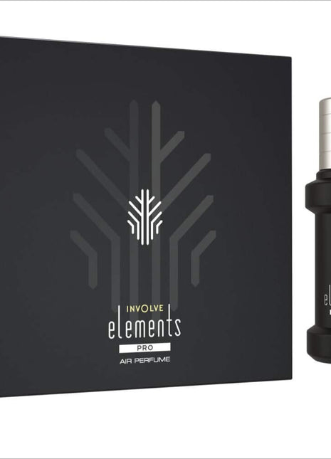 a bottle of perfume next to a box