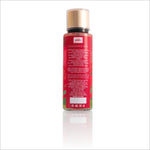 Back view of Lovey Dovey Body Mist by BIRRA. The label lists detailed product information, including ingredients and usage instructions, against a colorful background that matches the bottle's design.