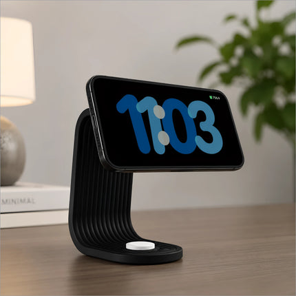 Black curved ribbed charging stand with white base holding an iPhone for apple watch and desk dock use