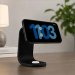 Black curved ribbed charging stand with white base holding an iPhone for apple watch and desk dock use
